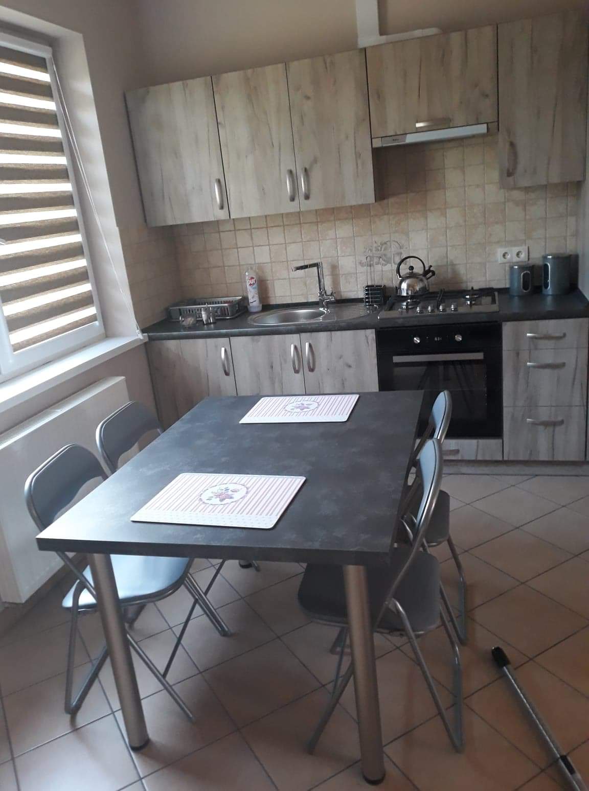 Kuchnia z jadalnią w apartamencie